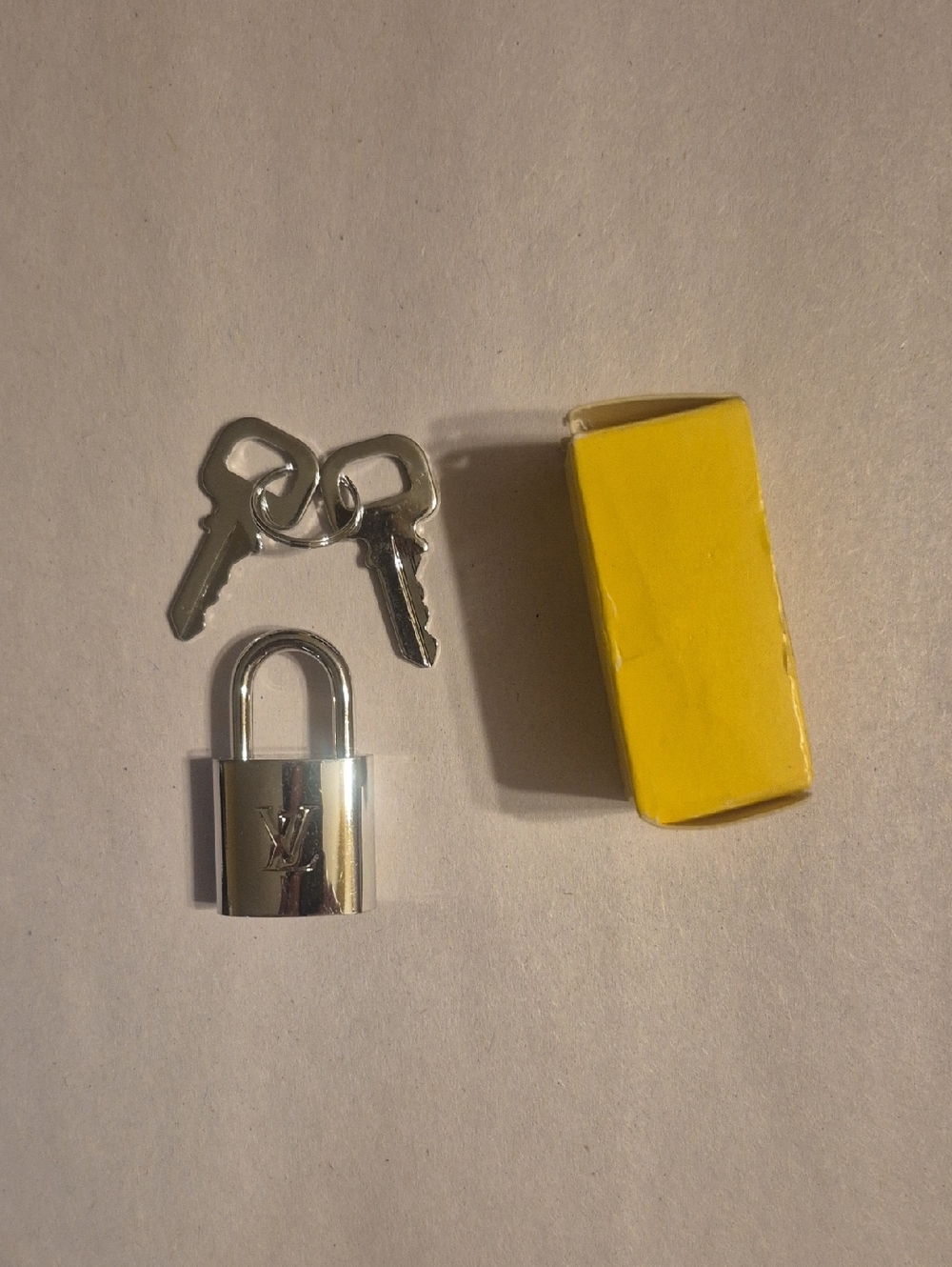 Louie Vuttion Silver Lock & Key NWOT